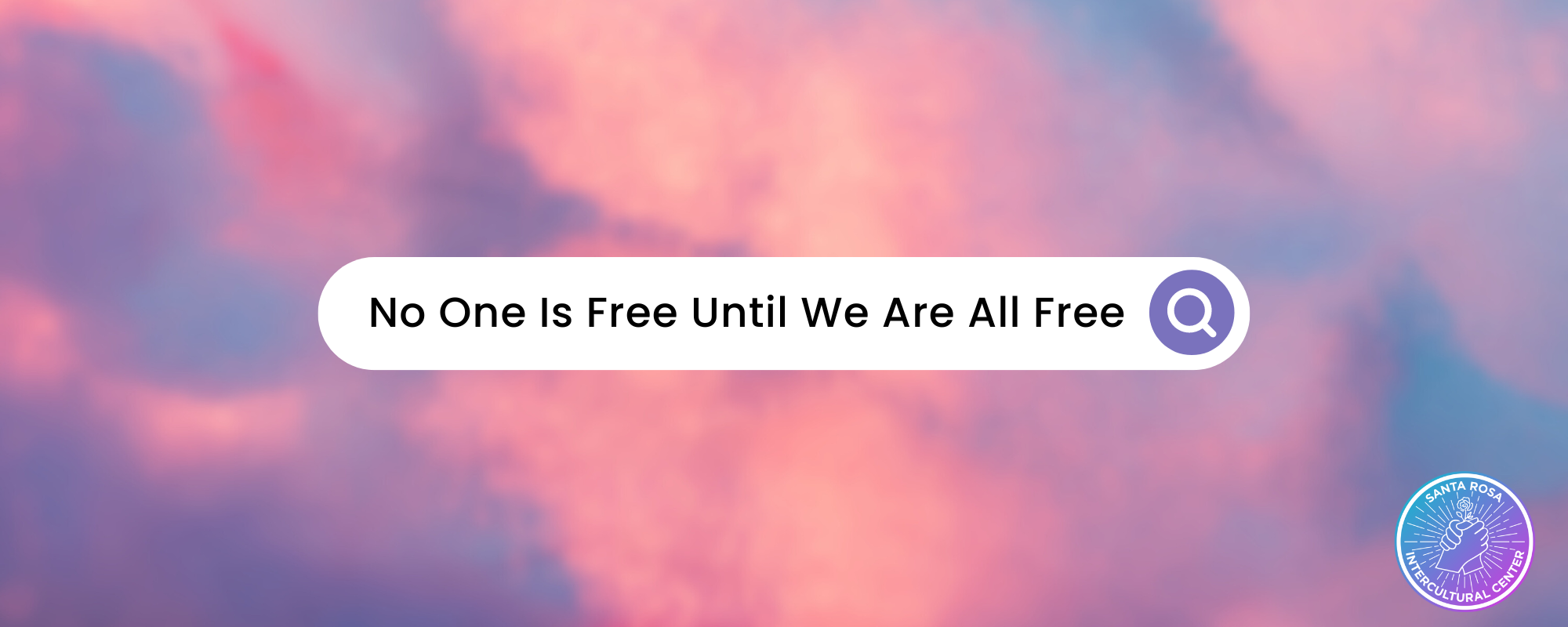 pink gradient background with the words "No One Is Free Until We Are All Free"